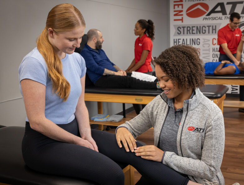 Woman receiving a free injury screening